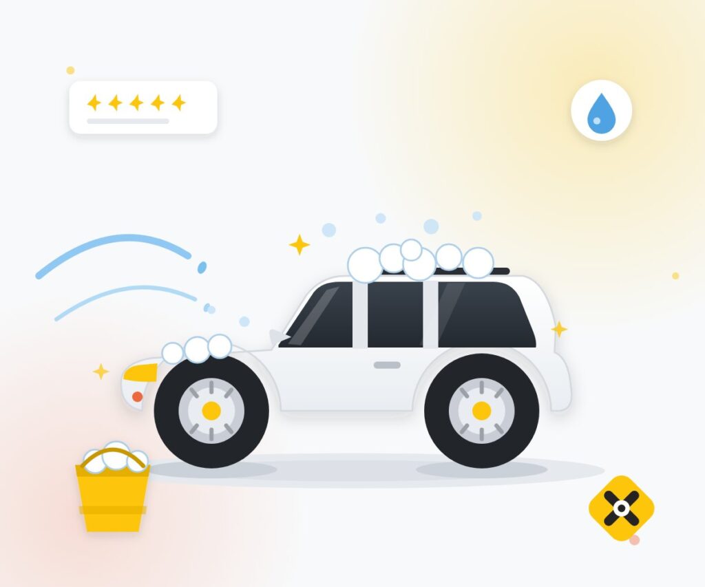 Professional car cleaning service in Qatar washing an SUV