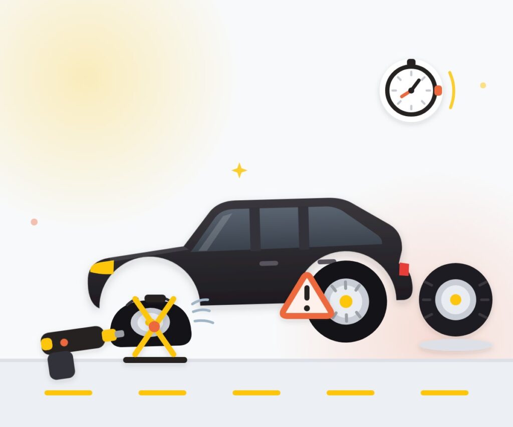 Changing a flat car tyre with a jack and spare tyre
