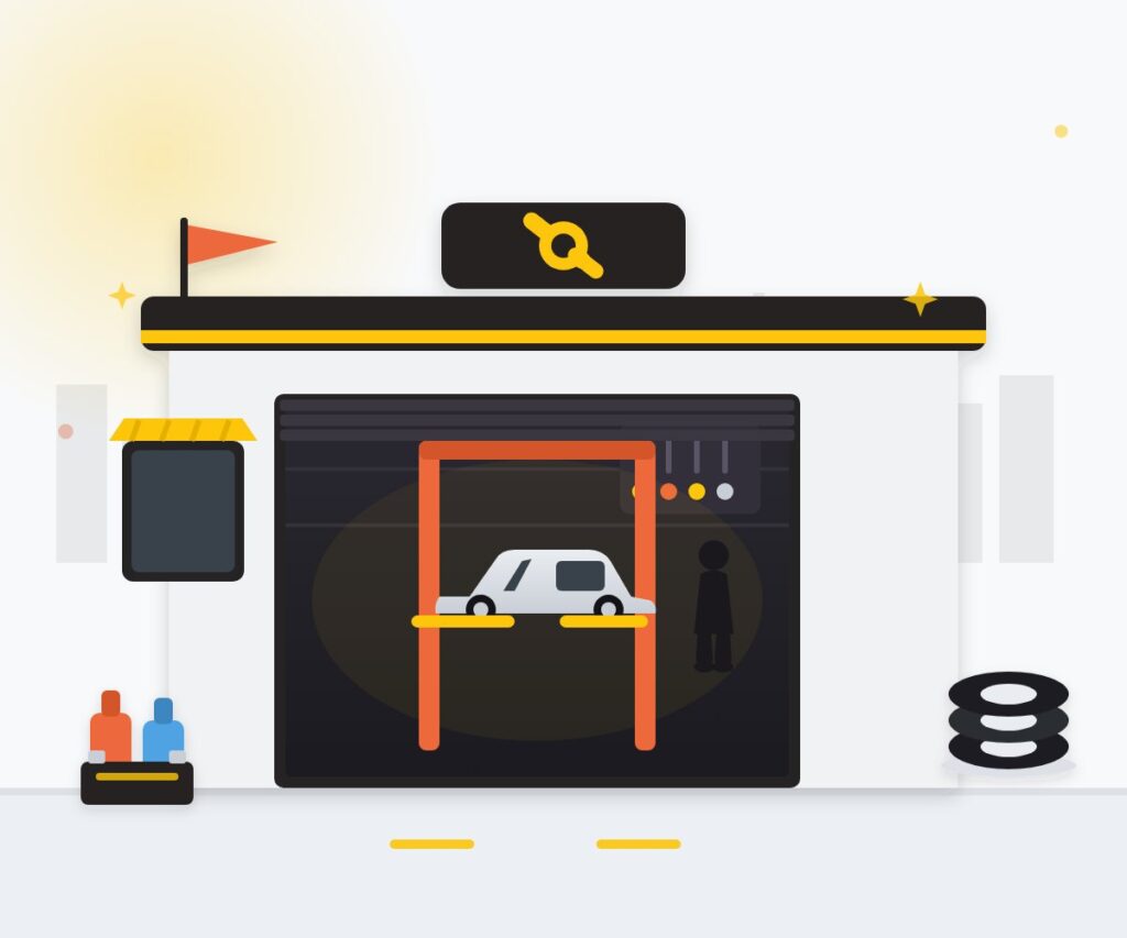 Car service center workshop in Qatar with car on lift