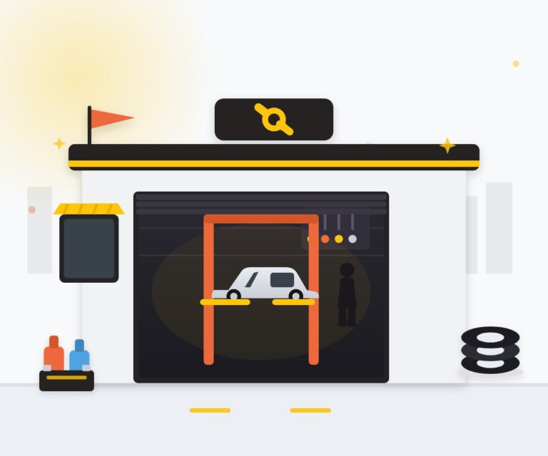 Car service center workshop in Qatar with car on lift